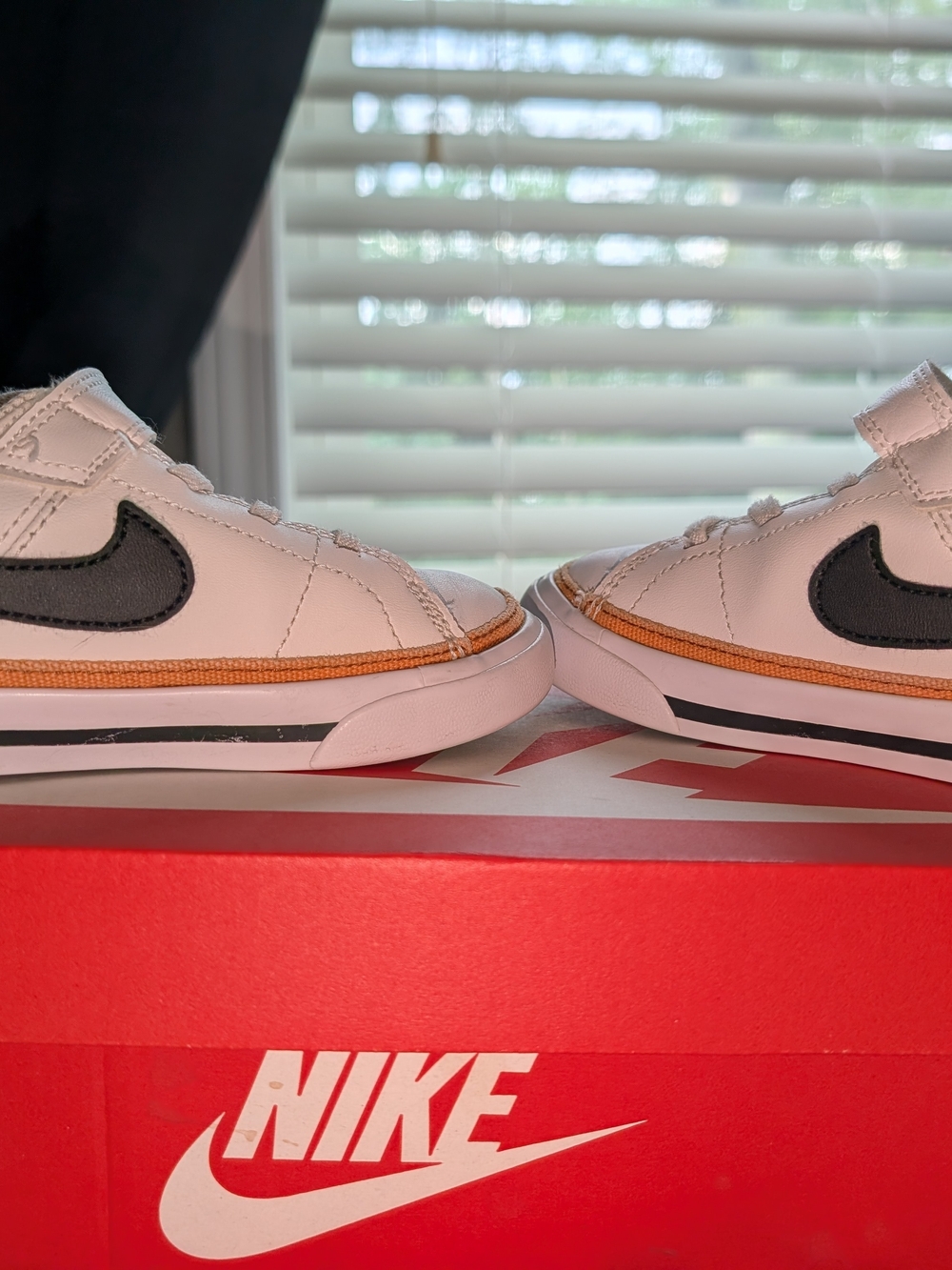 Nike Kids White Sneaker with Black Swoosh and Orange Trim - Picture 4 of 6